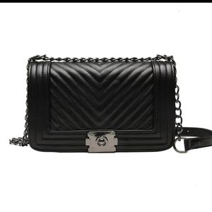 Black medium sized handbag